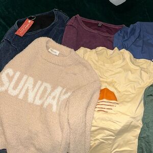 Bundle of 7 brand new long sleeve and short sleeve tops.